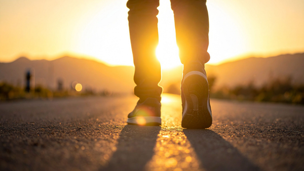 Taking the first step on a sunlit road