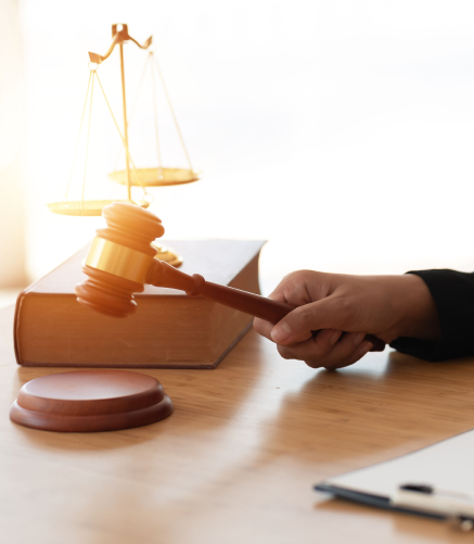 closeup-businesswoman-lawyer-woman-hands-knocking-hammer-judge-scales-paper-office-desk-legal-work 1