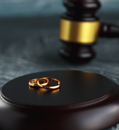 two-broken-golden-wedding-rings-divorce-decree-document-divorce-separation-concept 1
